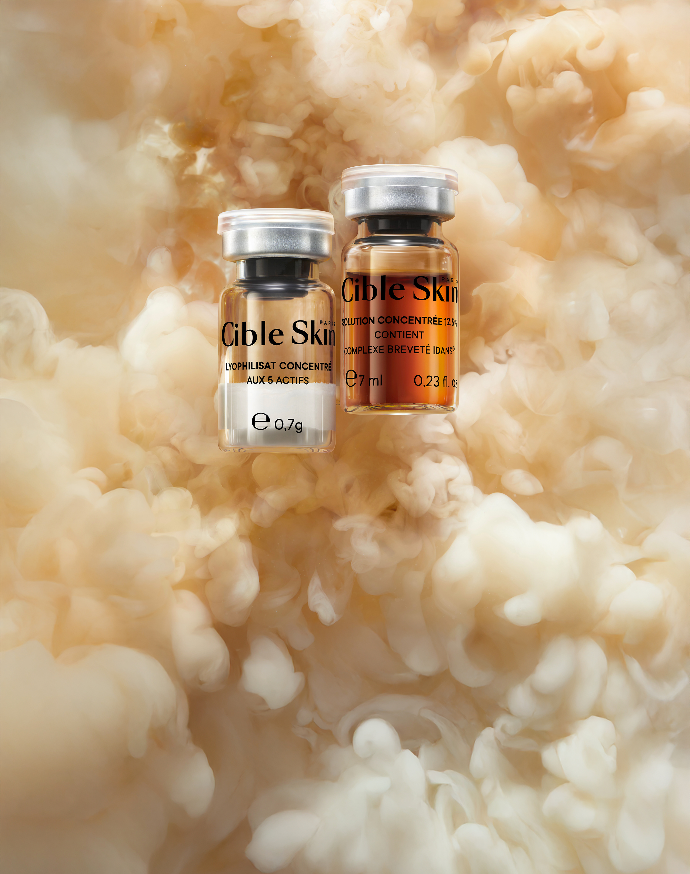 Flacons Cible Skin sur fond nuageux